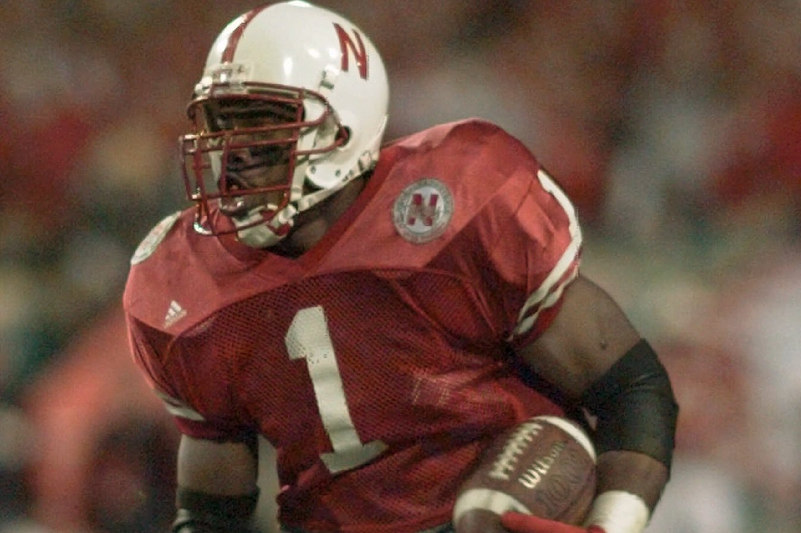 Nebraska's Lawrence Phillips (1) scampers into the endzone for the Huskers first tocuhdown during the first quarter of the Fiesta Bowl with Florida in Tempe, Ariz., Tuesday evening, Jan. 2, 1996.  (AP Photo/Eric Draper)