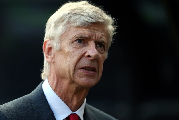 Arsenal's manager Arsene Wenger awaits the start of their English Premier League soccer match between Newcastle United and Arsenal at St James' Park, Newcastle, England, Saturday, Aug. 29, 2015. (AP Photo/Scott Heppell)