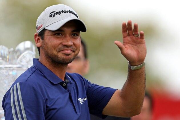 Jason Day, of Australia, waves to the crowd after winning The Barclays golf tournament Sunday, Aug. 30, 2015, in Edison, N.J. Day finished 19 under with a 261 total. (AP Photo/Adam Hunger)