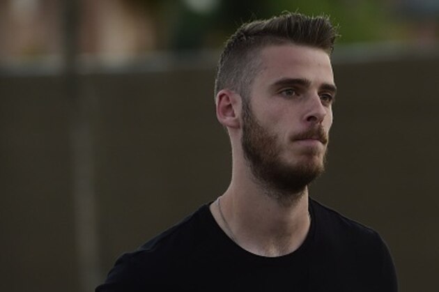Manchester United's goalkeeper David de Gea arrives at Las Rozas' Soccer City on September 1, 2015. Real Madrid have blamed Manchester United for the collapse of goalkeeper David de Gea's move to the Spanish giants, claiming the English side sent the documents needed to complete the deal after the Spanish transfer deadline had passed. AFP PHOTO/ PIERRE-PHILIPPE MARCOU        (Photo credit should read PIERRE-PHILIPPE MARCOU/AFP/Getty Images)