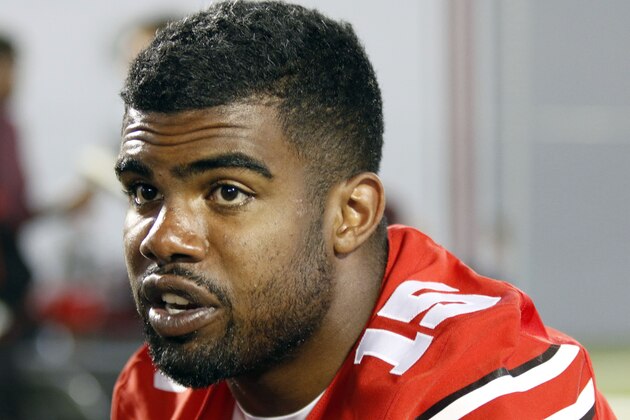 In this Aug. 16, 2015 photo, Ohio State running back Ezekiel Elliott  speaks to reporters during the university's NCAA college football media day in Columbus, Ohio. More college football stars are starting to snatch up trademark rights to their names, nicknames and fan slogans. This month Elliott applied for trademarks to use his nicknames “Zeke” and “Eze” on merchandise, according to records in a public database kept by the U.S. Patent and Trademark Office. (AP Photo/Paul Vernon)