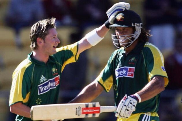 WELLINGTON, NEW ZEALAND - DECEMBER 07: Andrew Symonds of Australia (R) is congratulated by team-mate Michael Clarke (L) after making 150 runs during the second Chappell-Hadlee Trophy one day international between New Zealand and Australia played at Westpac Stadium December 07, 2005 in Wellington, New Zealand.  (Photo by Phil Walter/Getty Images)