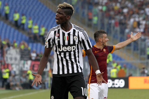 Juventus’ Paul Pogba reacts during a Serie A soccer match between Roma and Juventus, at Rome's Olympic stadium, Sunday, Aug. 30, 2015. (AP Photo/Riccardo De Luca)