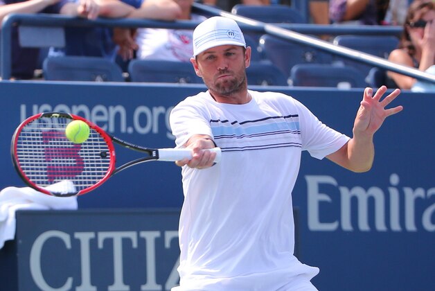 Sep 2, 2015; New York, NY, USA;  Mardy Fish of the United States returns a shot to Feliciano Lopez of Spain on day three of the 2015 U.S. Open tennis tournament at USTA Billie Jean King National Tennis Center. Mandatory Credit: Anthony Gruppuso-USA TODAY Sports