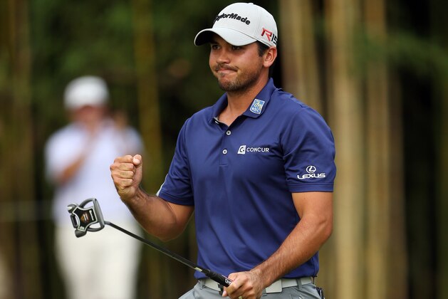 Jason Day, of Australia, reacts after hitting a birdie putt on the 14th green during the final round of play at The Barclays golf tournament Sunday, Aug. 30, 2015, in Edison, N.J. Day finished 19 under with a 261 total. (AP Photo/Adam Hunger)