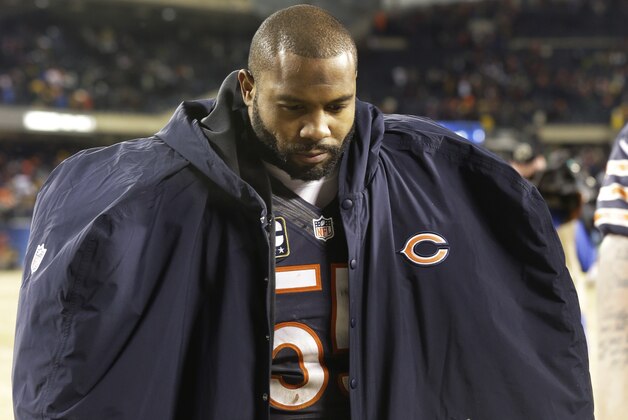 Chicago Bears linebacker Lance Briggs (55) walks off the field after the Bears' 33-28 loss to the Green Bay Packers in an NFL football game on Sunday, Dec. 29, 2013, in Chicago. (AP Photo/Nam Y. Huh)
