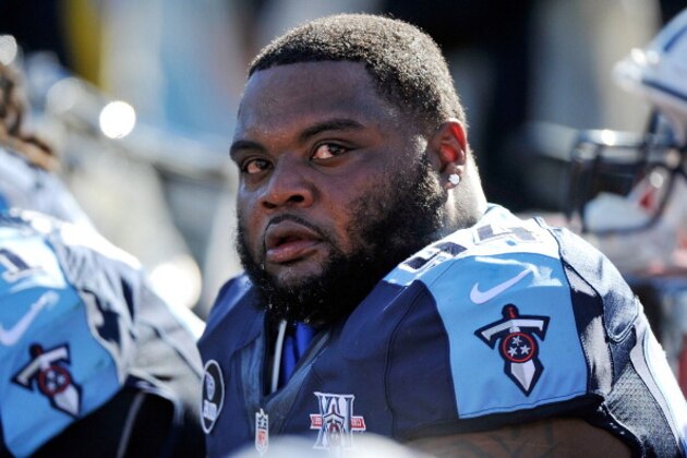 NASHVILLE, TN - NOVEMBER 10:  Sammie Lee Hill #94 of the Tennessee Titans watches from the sideline during a game against the Jacksonville Jaguars at LP Field on November 10, 2013 in Nashville, Tennessee.  (Photo by Frederick Breedon/Getty Images)