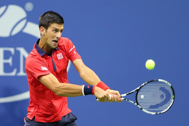 Sep 2, 2015; New York, NY, USA; Novak Djokovic of Serbia returns a shot to Andreas Haider-Maurer of Austria on day three of the 2015 U.S. Open tennis tournament at USTA Billie Jean King National Tennis Center. Mandatory Credit: Jerry Lai-USA TODAY Sports