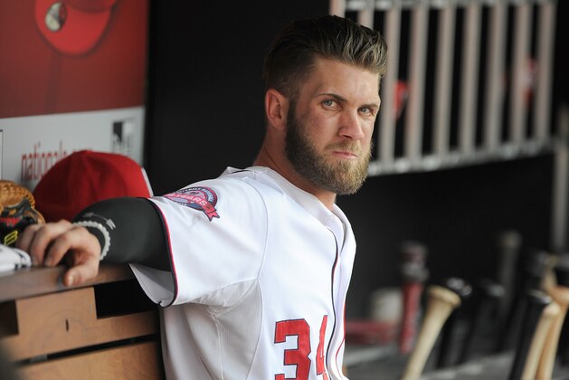 WASHINGTON, DC - AUGUST 30:  Bryce Harper #34 of the Washington Nationals watches the game against the Miami Marlins at Nationals Park on August 30, 2015 in Washington, DC.  (Photo by G Fiume/Getty Images)
