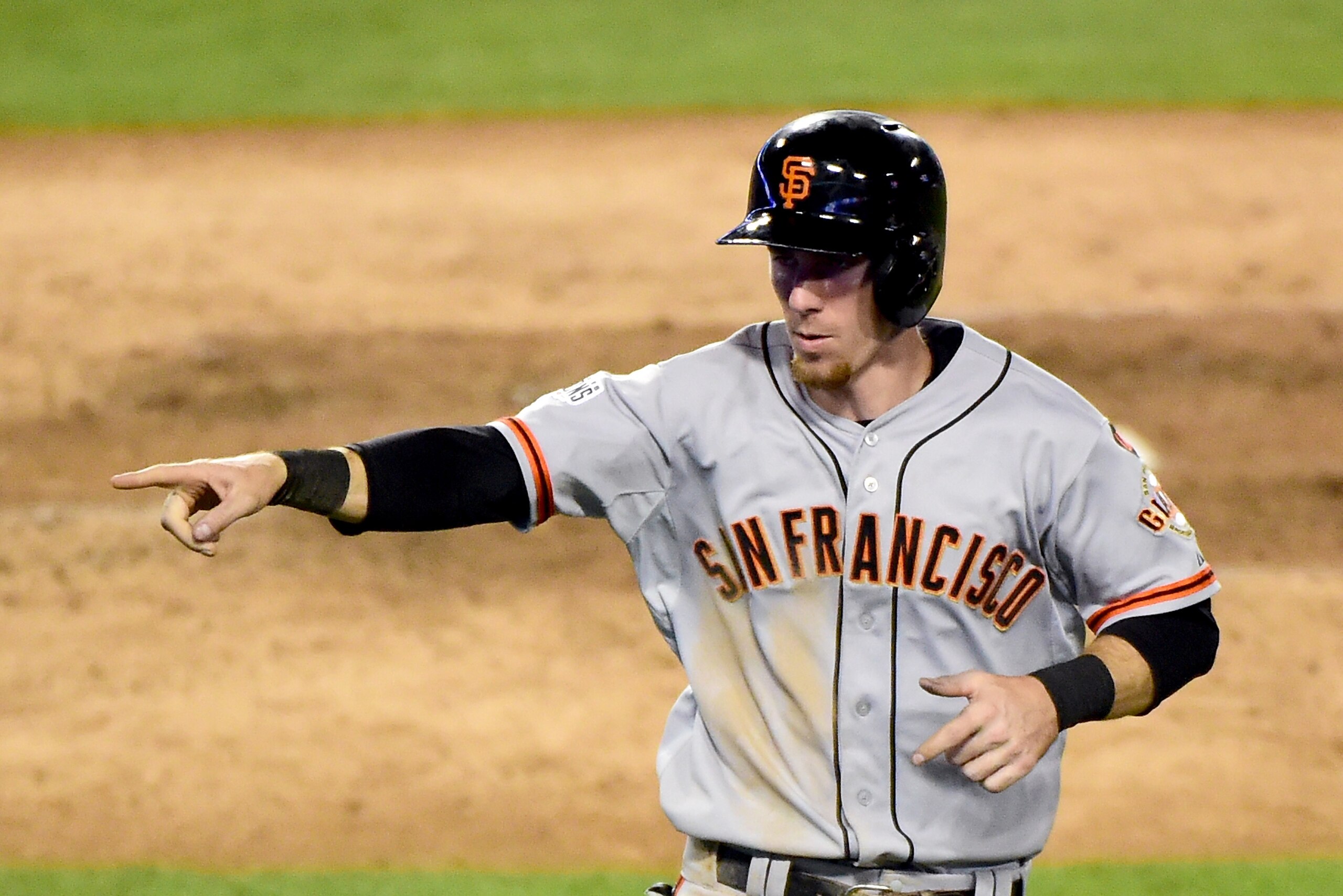 LOS ANGELES, CA - AUGUST 31:  Matt Duffy #5 of the San Francisco Giants reacts to his run to tie the game 4-4 with the Los Angeles Dodgers during the eighth inning at Dodger Stadium on August 31, 2015 in Los Angeles, California.  (Photo by Harry How/Getty Images)