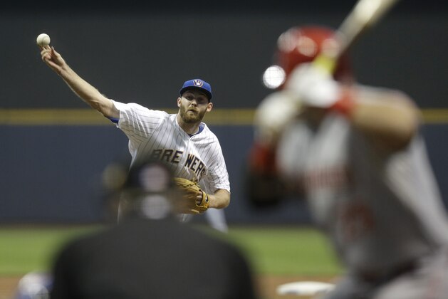 MILWAUKEE, WI - AUGUST 28: Taylor Jungmann #41 of the Milwaukee Brewers pitches during the first inning against the Cincinnati Reds at Miller Park on August 28, 2015 in Milwaukee, Wisconsin. (Photo by Mike McGinnis/Getty Images)