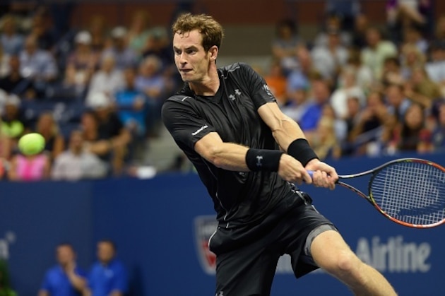 Andy Murray of Great Britain hits a return to Nick Kyrgios of Australia during their US Open 2015 first round men's singles match at the USTA Billie Jean King National Center September 1, 2015  in New York. AFP PHOTO/DON EMMERT        (Photo credit should read DON EMMERT/AFP/Getty Images)