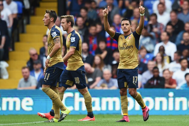 LONDON, ENGLAND - AUGUST 16: Alexis Sanchez of Arsenal celebrates the own goal scored by Damien Delaney of Crystal Palace during the Barclays Premier League match between Crystal Palace and Arsenal at Selhurst Park on August 16, 2015 in London, England.  (Photo by Michael Regan/Getty Images)