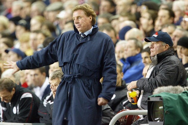 LIVERPOOL, ENGLAND - MARCH 17:  Harry Redknapp and Jim Smith of Portsmouth look on during the FA Barclaycard Premiership match between Liverpool and Portsmouth at Anfield on March 17, 2004 in Liverpool, England.  (Photo by Laurence Griffiths/Getty Images)