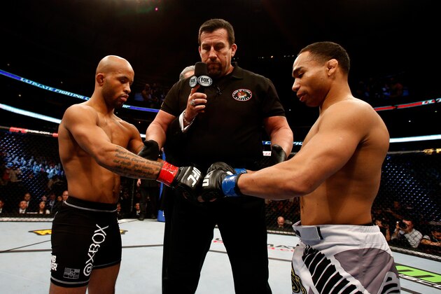 CHICAGO, IL - JANUARY 26: John Dodson (R) taps gloves with Demetrious Johnson (L) during thier Flyweight Championship Bout part of UFC on FOX at United Center on January 26, 2013 in Chicago, Illinois. (Photo by Josh Hedges/Zuffa LLC/Zuffa LLC Via Getty Images) CHICAGO, IL - JANUARY 26: John Dodson (R) taps gloves with Demetrious Johnson (L) during thier Flyweight Championship Bout part of UFC on FOX at United Center on January 26, 2013 in Chicago, Illinois. (Photo by Josh Hedges/Zuffa LLC/Zuffa LLC Via Getty Images)