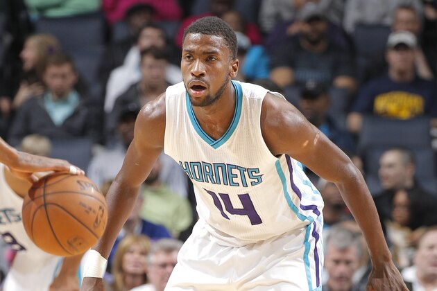 CHARLOTTE, NC - MARCH 11: Michael Kidd-Gilchrist #14 of the Charlotte Hornets defends the Sacramento Kings on March 11, 2015 at Time Warner Cable Arena in Charlotte, North Carolina. NOTE TO USER: User expressly acknowledges and agrees that, by downloading and or using this Photograph, user is consenting to the terms and condition of the Getty Images License Agreement.  (Photo by Rocky Widner/Getty Images)