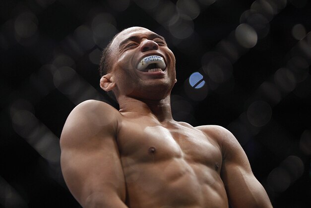 Oct 19, 2013; Houston, TX, USA; John Dodson reacts after defeating Darrell Montague (not pictured) by knockout in their flyweight bout during UFC 166 at Toyota Center. Mandatory Credit: Andrew Richardson-USA TODAY Sports Oct 19, 2013; Houston, TX, USA; John Dodson reacts after defeating Darrell Montague (not pictured) by knockout in their flyweight bout during UFC 166 at Toyota Center. Mandatory Credit: Andrew Richardson-USA TODAY Sports