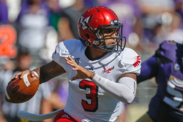SEATTLE, WA - SEPTEMBER 06:  Quarterback Vernon Adams Jr. #3 of the Eastern Washington Eagles rushes against the Washington Huskies on September 6, 2014 at Husky Stadium in Seattle, Washington.  (Photo by Otto Greule Jr/Getty Images)