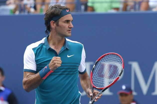 Roger Federer of Switzerland celebrates after defeating Leonardo Mayer of Argentina during their 2015 US Open Men's Singles round 1 match at the USTA Billie Jean King National Tennis Center September 1, 2015 in New York. AFP PHOTO/KENA BETANCUR        (Photo credit should read KENA BETANCUR/AFP/Getty Images)