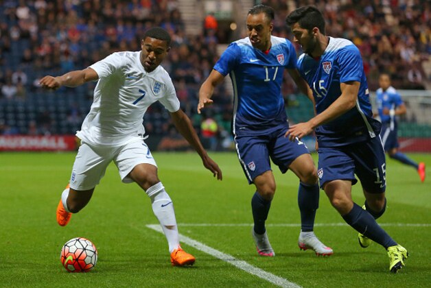 PRESTON, ENGLAND - SEPTEMBER 3: Jordan Ibe of England takes on Jerome Kiesewetter of USA, centre, and Eric Miller of USA, right, during the International friendly match between England U21 and USA U23 at Deepdale on September 3, 2015 in Preston, England. (Photo by Dave Thompson/Getty Images)