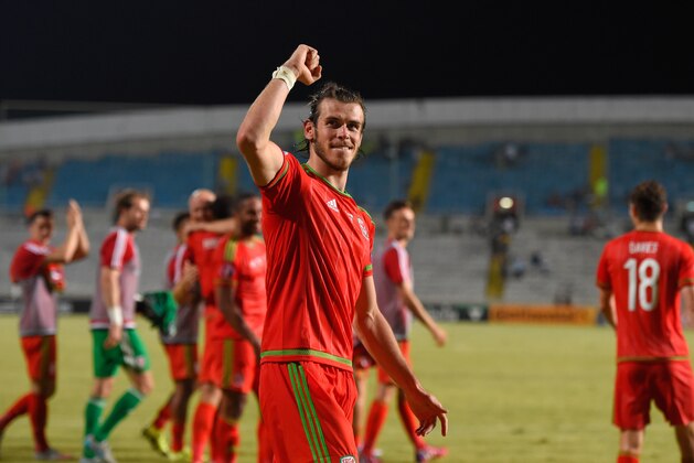 NICOSIA, CYPRUS - SEPTEMBER 03: Wales striker Gareth Bale celebrates after the UEFA EURO 2016 Qualifier between Cyprus and Wales at GPS Stadium on September 3, 2015 in Nicosia, Cyprus. (Photo by Stu Forster/Getty Images) NICOSIA, CYPRUS - SEPTEMBER 03: Wales striker Gareth Bale celebrates after the UEFA EURO 2016 Qualifier between Cyprus and Wales at GPS Stadium on September 3, 2015 in Nicosia, Cyprus. (Photo by Stu Forster/Getty Images)