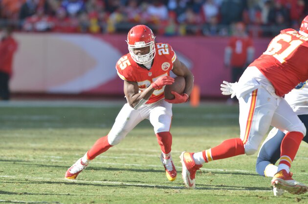 Dec 28, 2014; Kansas City, MO, USA; Kansas City Chiefs running back Jamaal Charles (25) runs the ball during the first half against the San Diego Chargers at Arrowhead Stadium. Mandatory Credit: Denny Medley-USA TODAY Sports