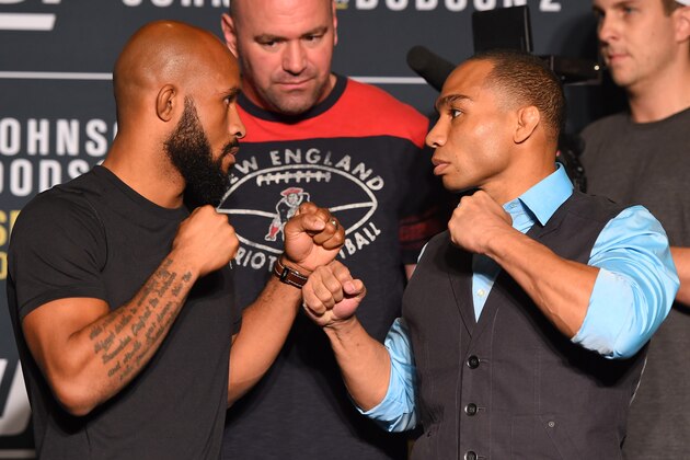 LAS VEGAS, NV - SEPTEMBER 03:  (L-R) Opponents Demetrious Johnson and John Dodson face off during the UFC 191 Ultimate Media Day at MGM Grand Hotel & Casino on September 3, 2015 in Las Vegas, Nevada. (Photo by Josh Hedges/Zuffa LLC/Zuffa LLC via Getty Images)