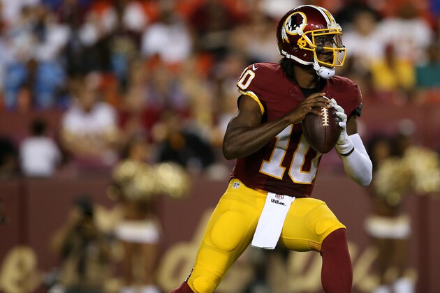 LANDOVER, MD - AUGUST 20: Quarterback Robert Griffin III #10 of the Washington Redskins looks to make a pass during a preseason game against the Detroit Lions at FedEx Field on August 20, 2015 in Landover, Maryland.  (Photo by Matt Hazlett/Getty Images)