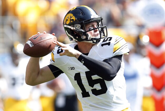 Sep 20, 2014; Pittsburgh, PA, USA; Iowa Hawkeyes quarterback Jake Rudock (15) passes the ball against the Pittsburgh Panthers during the first quarter at Heinz Field. Mandatory Credit: Charles LeClaire-USA TODAY Sports