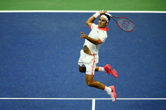 NEW YORK, NY - SEPTEMBER 03:  Roger Federer of Switzerland returns a shot to  Steve Darcis of Belgium during their Men's Singles Second Round match on Day Four of the 2015 US Open at the USTA Billie Jean King National Tennis Center on September 3, 2015 in the Flushing neighborhood of the Queens borough of New York City.  (Photo by Clive Brunskill/Getty Images)