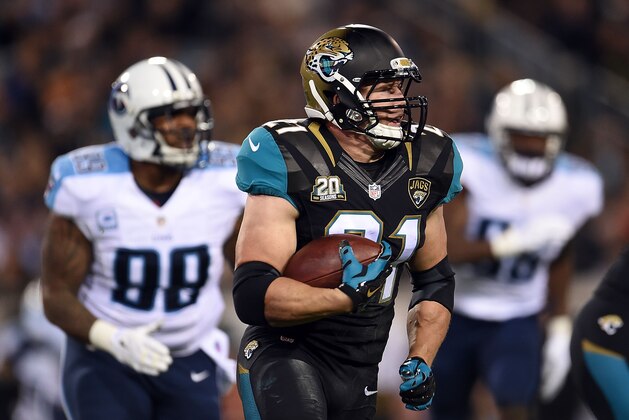 JACKSONVILLE, FL - DECEMBER 18:  Toby Gerhart #21 of the Jacksonville Jaguars runs for yards during a game against the Tennessee Titans at EverBank Field on December 18, 2014 in Jacksonville, Florida.  Jacksonville won the game 21-13.  (Photo by Stacy Revere/Getty Images)