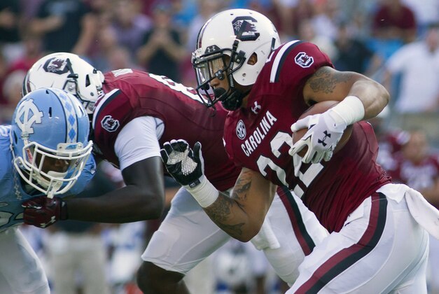 Sep 3, 2015; Charlotte, NC, USA; South Carolina Gamecocks running back Brandon Wilds (22) carries the ball during the first quarter against the North Carolina Tar Heels at Bank of America Stadium. Mandatory Credit: Joshua S. Kelly-USA TODAY Sports