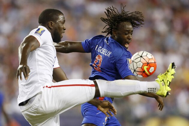 United States' Jozy Altidore (L) battles Haiti's Reginal Goreux during the CONCACAF Gold Cup match between the United States and Haiti, July 10, 2015, in Foxborough, Massachusetts. AFP PHOTO/DOMINICK REUTER        (Photo credit should read DOMINICK REUTER/AFP/Getty Images)