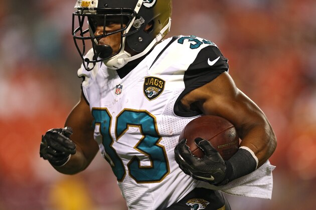 LANDOVER, MD - SEPTEMBER 03: Running back Corey Grant #33 of the Jacksonville Jaguars rushes for a second quarter touchdown against the Washington Redskins at FedExField on September 3, 2015 in Landover, Maryland. (Photo by Patrick Smith/Getty Images)