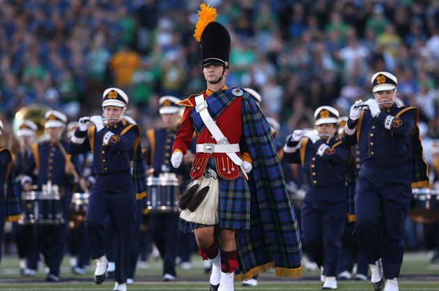 SOUTH BEND, IN - SEPTEMBER 06: A member of the Notre Dame Fighting Irish Guard marches with the band before a game against the Michigan Wolverines at Notre Dame Stadium on September 6, 2014 in South Bend, Indiana. Notre Dame defeated Michigan 31-0. (Photo by Jonathan Daniel/Getty Images)