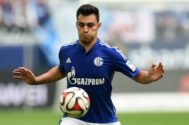 Schalke's defender Kaan Ayhan plays the ball during the German first division Bundesliga football match FC Schalke 04 vs Eintracht Frankfurt at the Veltins Arena in Gelsenkirchen, western Germany on September 20, 2014. The match ends 2-2.  AFP PHOTO / PATRIK STOLLARZ


DFL RULES TO LIMIT THE ONLINE USAGE DURING MATCH TIME TO 15 PICTURES PER MATCH. FOR FURTHER QUERIES PLEASE CONTACT DFL DIRECTLY AT + 49 69 650050.        (Photo credit should read PATRIK STOLLARZ/AFP/Getty Images)