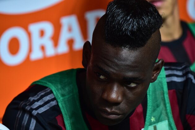 AC Milan's forward from Italy Mario Balotelli looks on before the Italian Serie A football match between AC Milan and Empoli  at San Siro Stadium in Milan on August 29, 2015. AFP PHOTO / GIUSEPPE CACACE        (Photo credit should read GIUSEPPE CACACE/AFP/Getty Images)