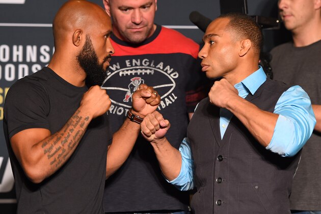 LAS VEGAS, NV - SEPTEMBER 03:  (L-R) Opponents Demetrious Johnson and John Dodson face off during the UFC 191 Ultimate Media Day at MGM Grand Hotel & Casino on September 3, 2015 in Las Vegas, Nevada. (Photo by Josh Hedges/Zuffa LLC/Zuffa LLC via Getty Images)