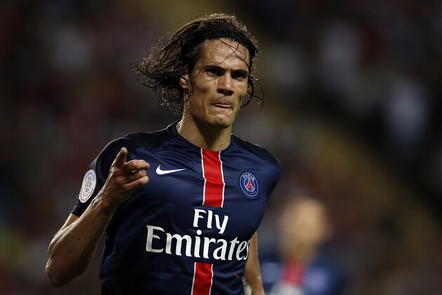 Paris Saint-Germain's Uruguayan forward Edinson Cavani celebrates after scoring his second goal during the French L1 football match Monaco (ASM) vs Paris Saint-Germain (PSG), on August 30, 2015 at the Louis II stadium in Monaco.       AFP PHOTO / VALERY HACHE        (Photo credit should read VALERY HACHE/AFP/Getty Images)