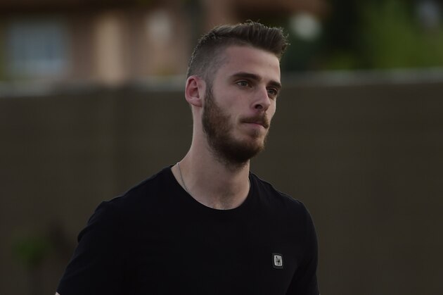 Manchester United's goalkeeper David de Gea arrives at Las Rozas' Soccer City on September 1, 2015. Real Madrid have blamed Manchester United for the collapse of goalkeeper David de Gea's move to the Spanish giants, claiming the English side sent the documents needed to complete the deal after the Spanish transfer deadline had passed. AFP PHOTO/ PIERRE-PHILIPPE MARCOU        (Photo credit should read PIERRE-PHILIPPE MARCOU/AFP/Getty Images)