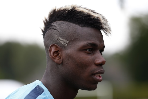 France's midlefielder Paul Pogba takes part in a training session in Clairefontaine-en-Yvelines on June 10, 2015 ahead of a friendly football match against Albania to be held on June 13. AFP PHOTO / THOMAS SAMSON        (Photo credit should read THOMAS SAMSON/AFP/Getty Images)