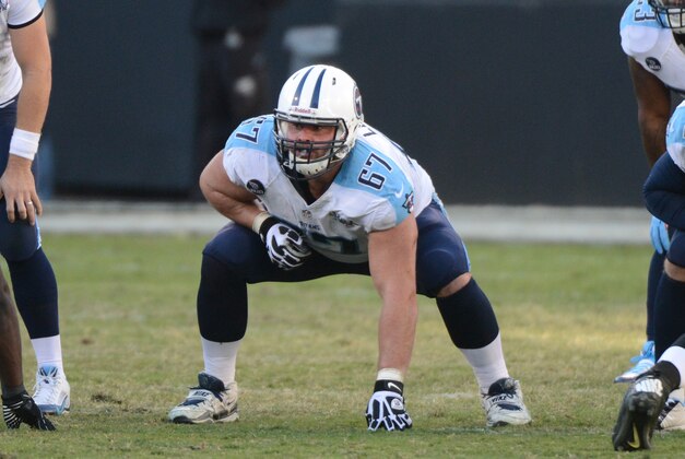 Nov 24, 2013; Oakland, CA, USA; Tennessee Titans guard Andy Levitre (67) at the line of scrimmage during the fourth quarter against the Oakland Raiders at O.co Coliseum. The Titans defeated the Raiders 23-19. Mandatory Credit: Kyle Terada-USA TODAY Sports