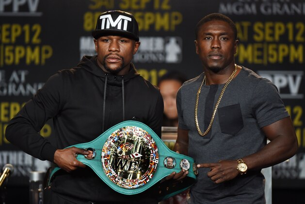 Boxers Floyd 'Money' Mayweather (L) and Andre Berto (R) face off during a press conference to officially announce their September 12 fight that will place at the MGM Grand Garden Arena in Las Vegas, at the Marriott Hotel in Los Angeles, California on August 6, 2015.  Mayweather claims it will be the last ever opportunity to see him fight.          AFP PHOTO / MARK RALSTON        (Photo credit should read MARK RALSTON/AFP/Getty Images)
