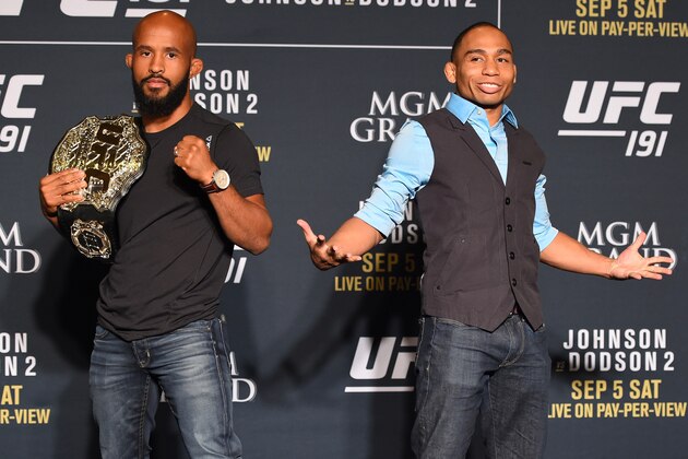 LAS VEGAS, NV - SEPTEMBER 03:  (L-R) Opponents Demetrious Johnson and John Dodson pose for photos during the UFC 191 Ultimate Media Day at MGM Grand Hotel & Casino on September 3, 2015 in Las Vegas, Nevada. (Photo by Josh Hedges/Zuffa LLC/Zuffa LLC via Getty Images)