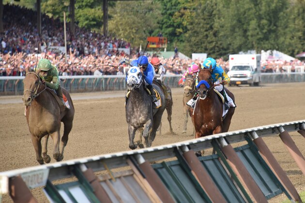 SARATOGA SPRINGS, NY - AUGUST 29: Keen Ice, with Javier Castellano up, defeats American Pharoah to win the 146th Travers Stakes for trainer Dale Romans on August 29, 2015 at Saratoga Race Course in Saratoga Springs, New York. (Photo by Horsephotos/Getty Images)