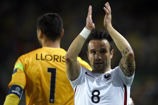 France's forward Mathieu Valbuena (R) applauds at the end of the Euro 2016 friendly football match Portugal vs France at the Jose Alvalade stadium in Lisbon on September 4, 2015. France won 0-1.  AFP PHOTO/ FRANCK FIFE        (Photo credit should read FRANCK FIFE/AFP/Getty Images)
