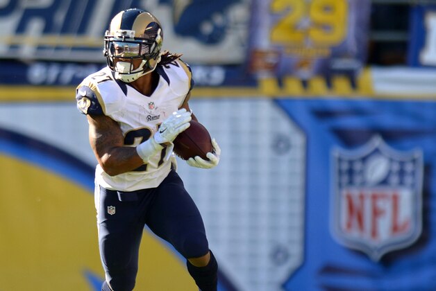 Nov 23, 2014; San Diego, CA, USA; St. Louis Rams running back Tre Mason (27) runs the ball during the second quarter against the San Diego Chargers at Qualcomm Stadium. Mandatory Credit: Jake Roth-USA TODAY Sports
