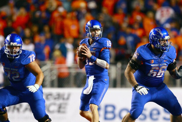 Sep 4, 2015; Boise, ID, USA; Boise State Broncos quarterback Ryan Finley (15) looks for a receiver down field during the first half verses the Washington Huskies at Albertsons Stadium. Mandatory Credit: Brian Losness-USA TODAY Sports