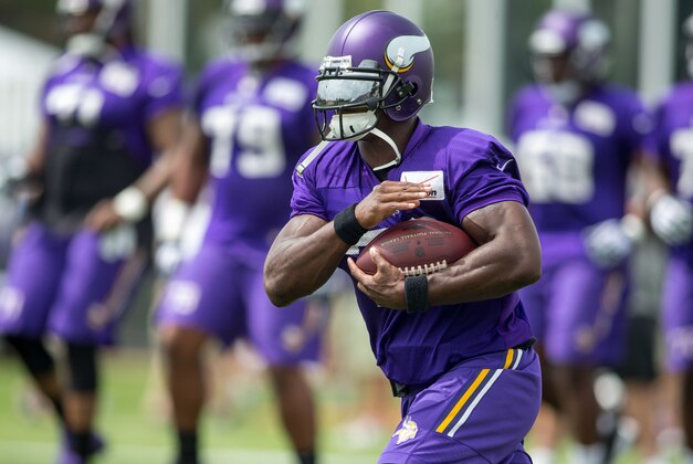 Jul 27, 2015; Mankato, MN, USA; Minnesota Vikings running back Adrian Peterson (28) rushes in drills at training camp at Minnesota State University. Mandatory Credit: Bruce Kluckhohn-USA TODAY Sports