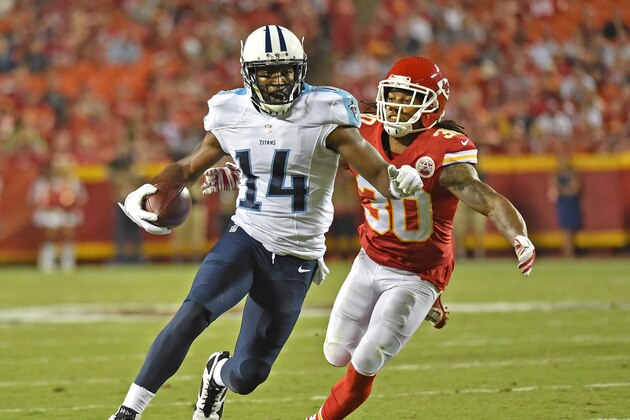 KANSAS CITY, MO - AUGUST 28:  Wide receiver Hakeem Nicks #14 of the Tennessee Titans runs up field against defensive back Jamell Fleming #30 of the Kansas City Chiefs during the first half of a preseason game at Arrowhead Stadium on August 28, 2015 in Kansas City, Missouri.  (Photo by Peter G. Aiken/Getty Images)